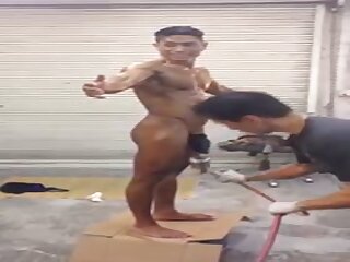 Young bodybuilder tanning