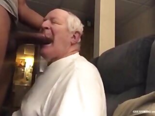 Nursing home patient giving head to aide.