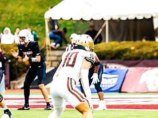 Watch this hot muscular blonde football player in uniform.