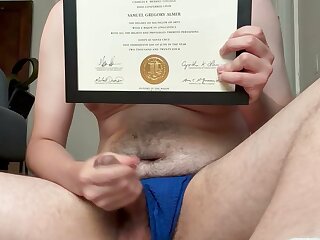 Proud graduate of UCSC and CSUN shows off his diplomas
